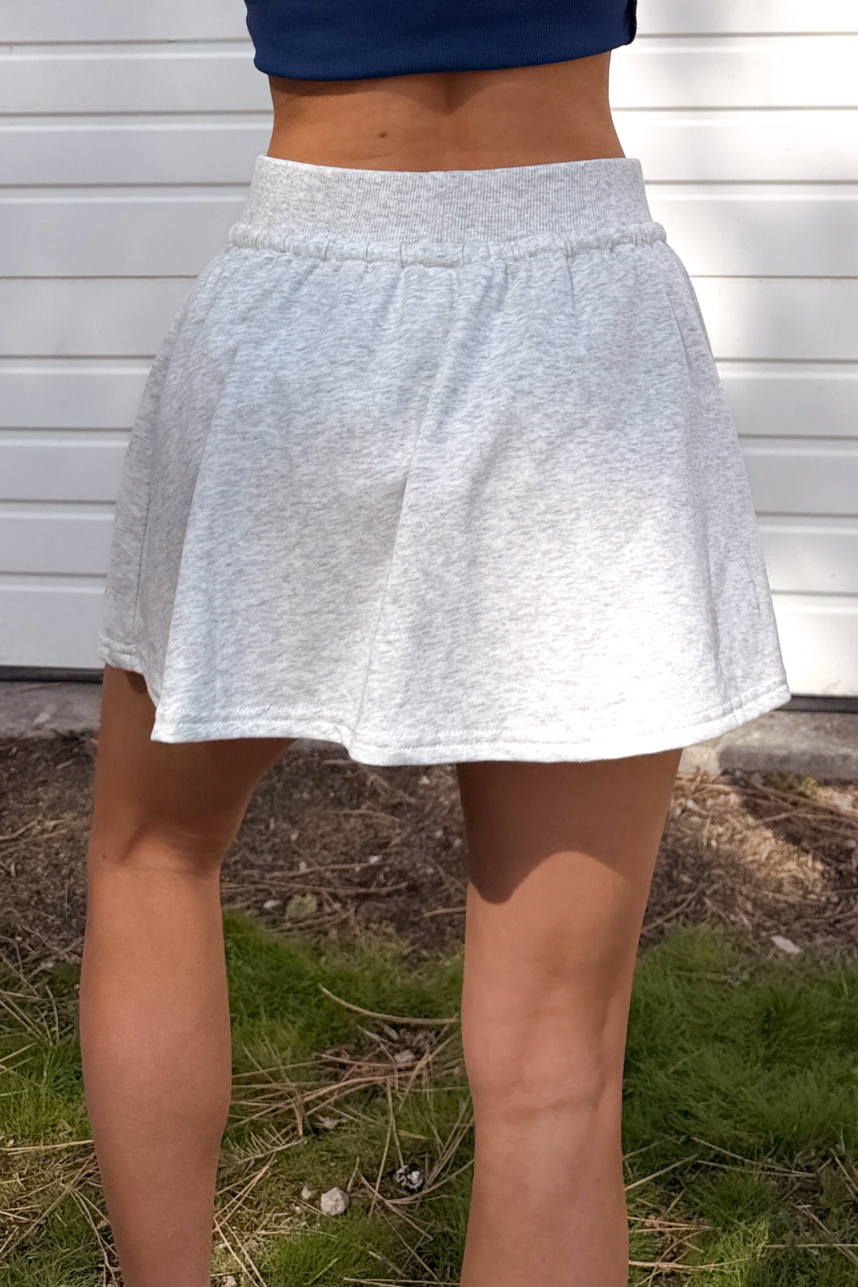 Daylight Dash Crop Top And Skort Set (White Melange)