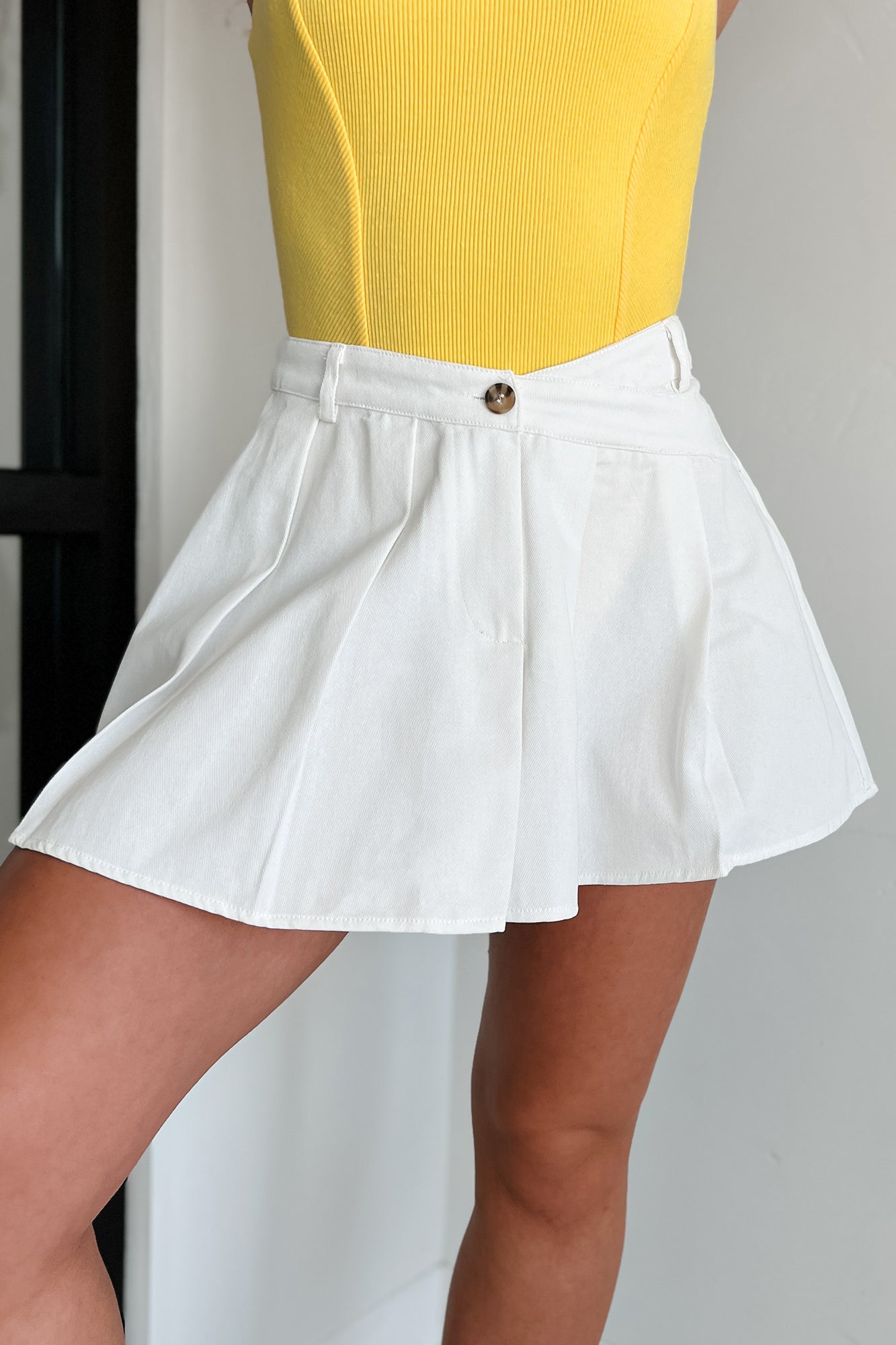 Divine Intuition Pleated Asymmetric Waist Mini Skirt (White)