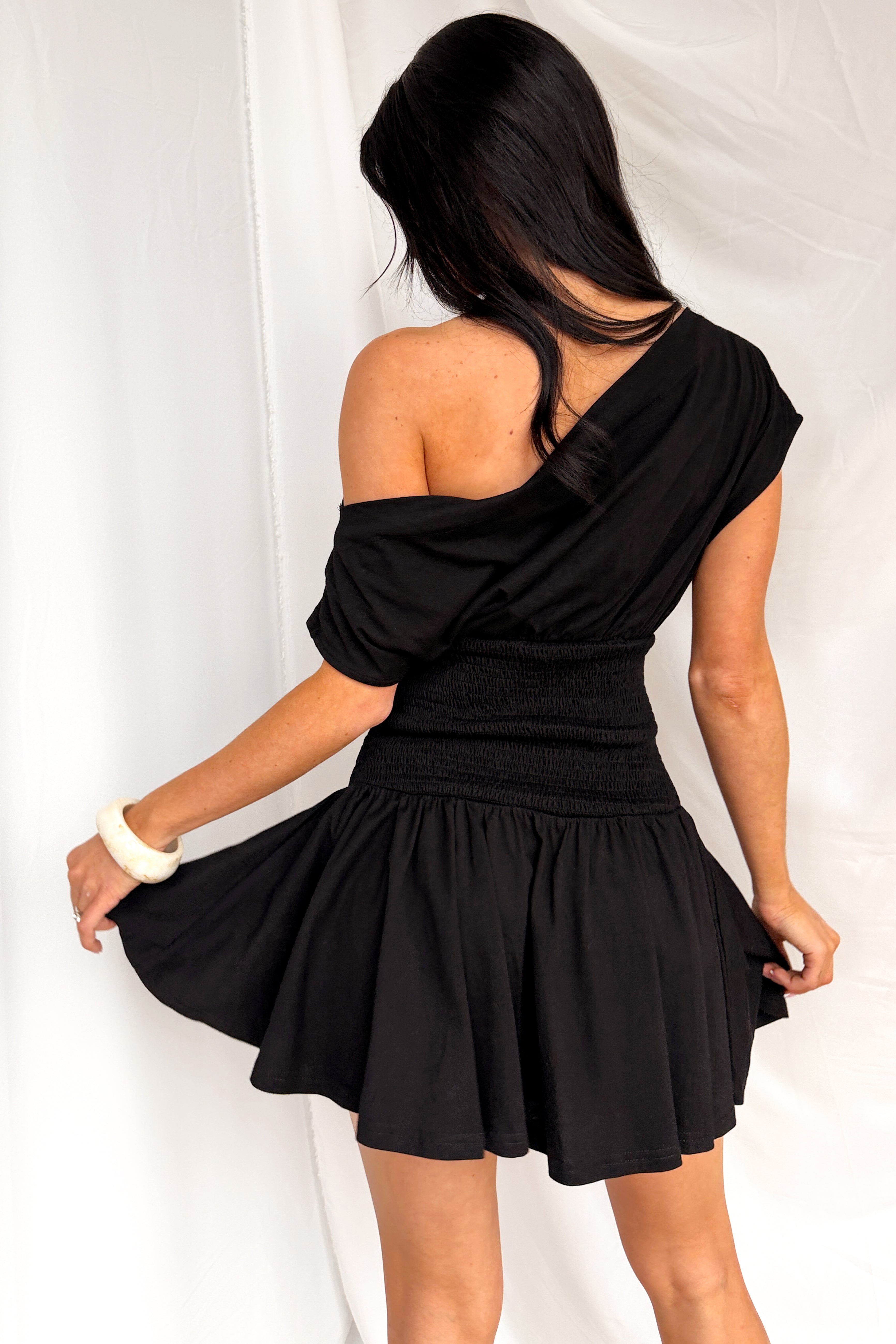 Neutral Ground One Shoulder Smocked Mini Dress (Black)