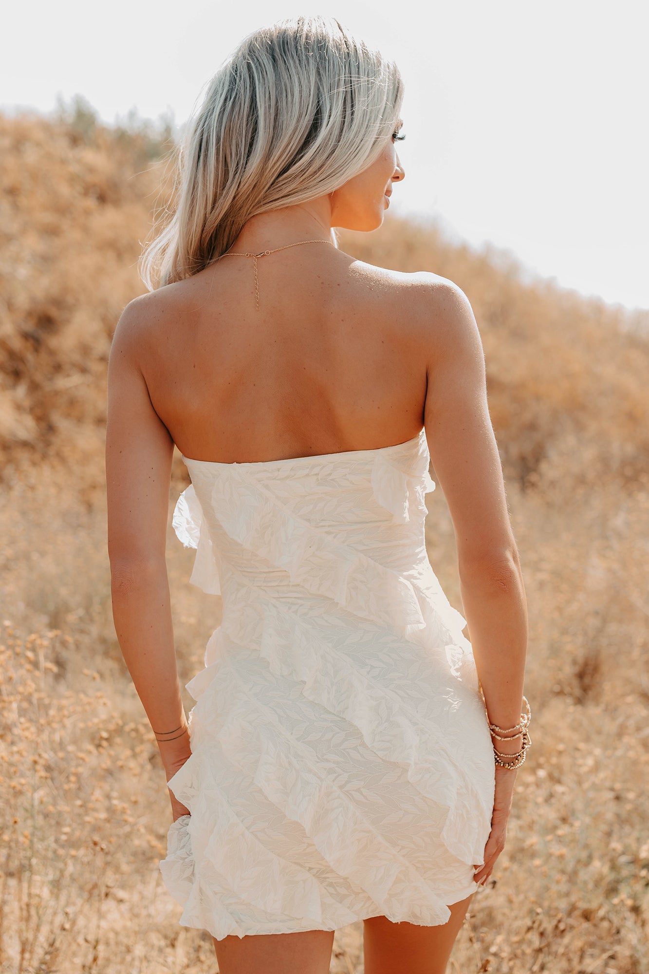 Prettiest Little Thing Strapless Ruffle Mini Dress (Off White)